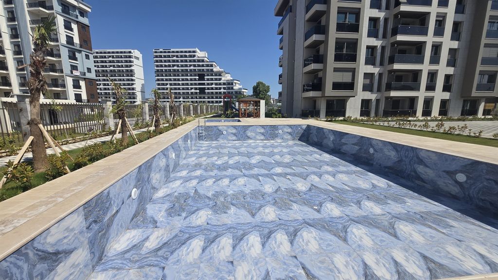 Property photo 3 of 13 1 & 2 Bedroom Antalya Homes In Altintas For Sale - Large Communal Swimming Pool