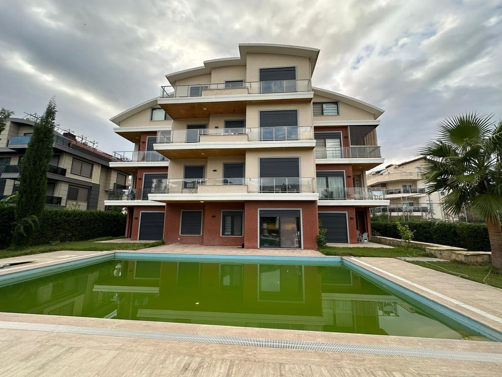 Property photo 1 of 19 Key-Ready Ground-Floor Apartment In Belek For Sale - Apartment Building With Communal Pool