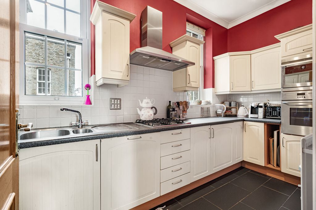 Property photo 3 of 17 Kitchen