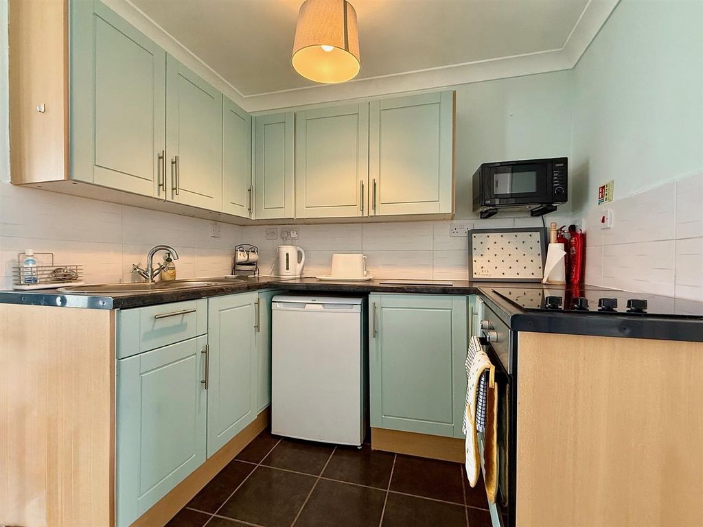 Property photo 2 of 9 Kitchen Area