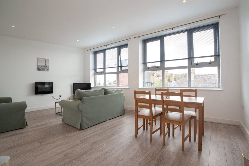 Property photo 1 of 17 Living/Dinig Area