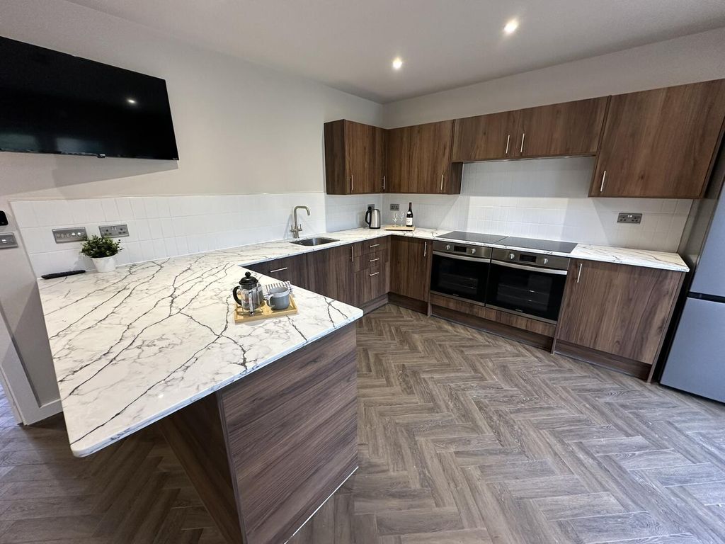 Property photo 1 of 12 Kitchen