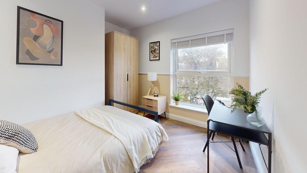 Property photo 2 of 18 A Bright And Inviting Double Bedroom Featuring Mod...