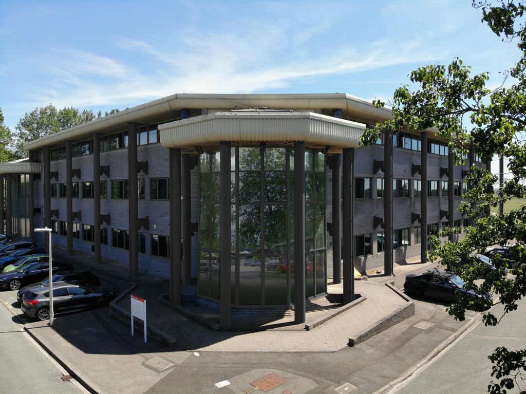 Property photo 1 of 9 7Side  Adjusted Photo Showing Dark Columns  Windows .Jpg