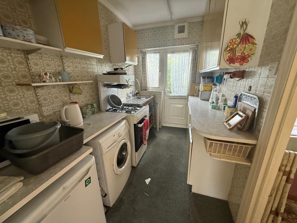 Property photo 2 of 8 Galley Style Kitchen