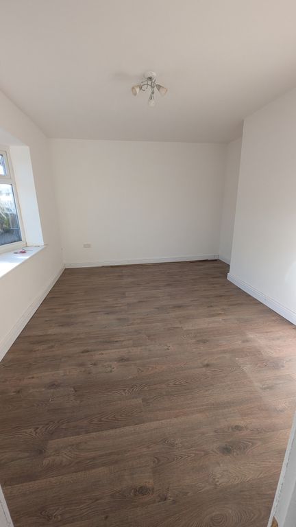 Property photo 3 of 8 Family Room