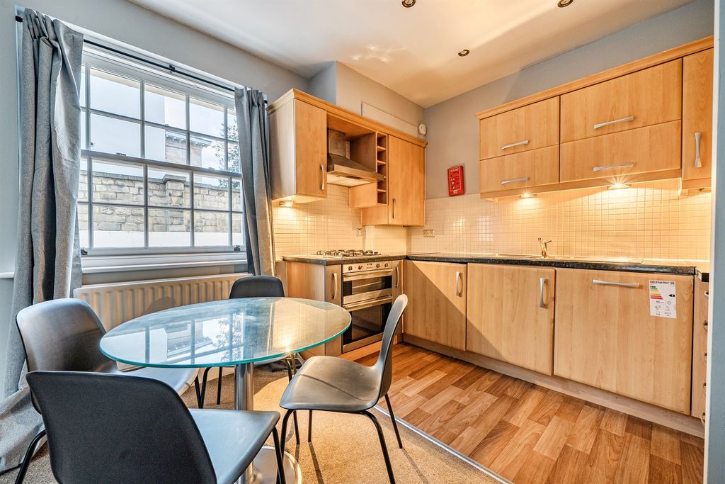 Property photo 3 of 9 Kitchen