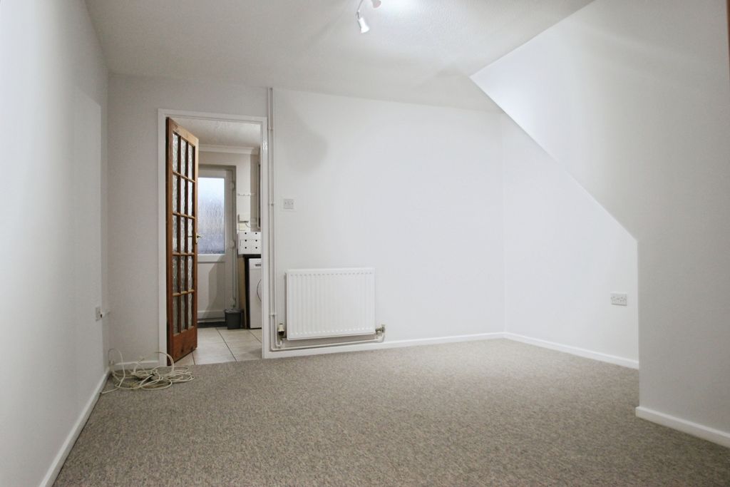 Property photo 2 of 10 Living Room - Angle 1