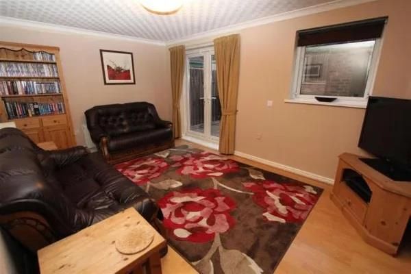 Property photo 3 of 10 Living Room: