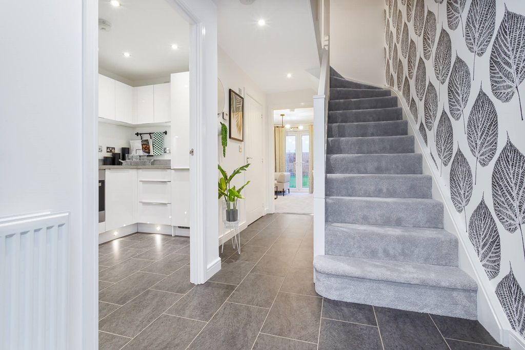 Property photo 3 of 10 The Andrew Home Has A Bright Hallway