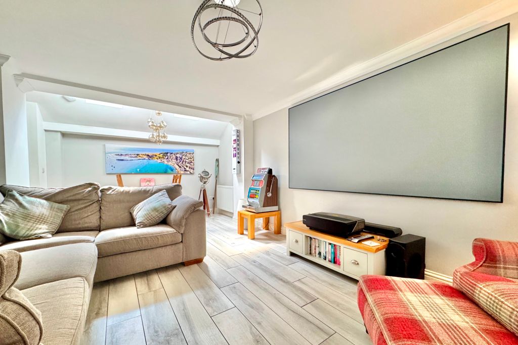 Property photo 3 of 12 Living Area