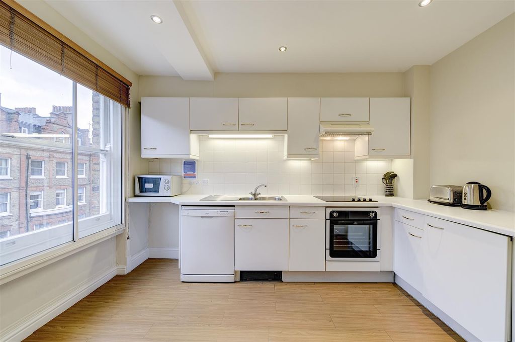 Property photo 2 of 6 Typical Kitchen.Jpg