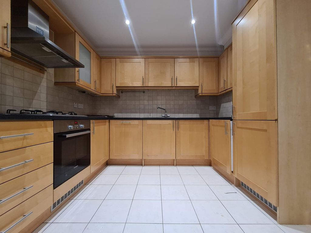 Property photo 2 of 12 Kitchen