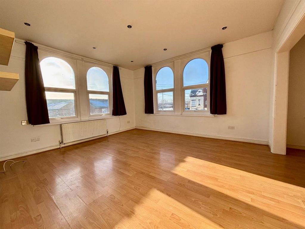 Property photo 2 of 6 Living Room: