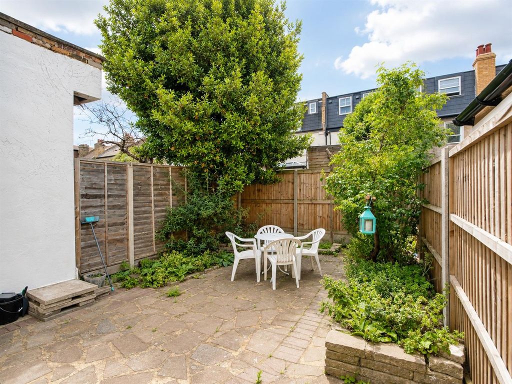Property photo 2 of 11 06_Patio_Garden_Straightened.Jpg