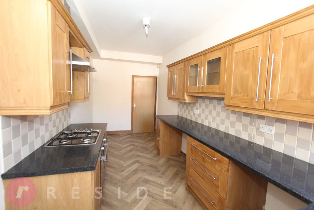 Property photo 3 of 12 Dining Kitchen