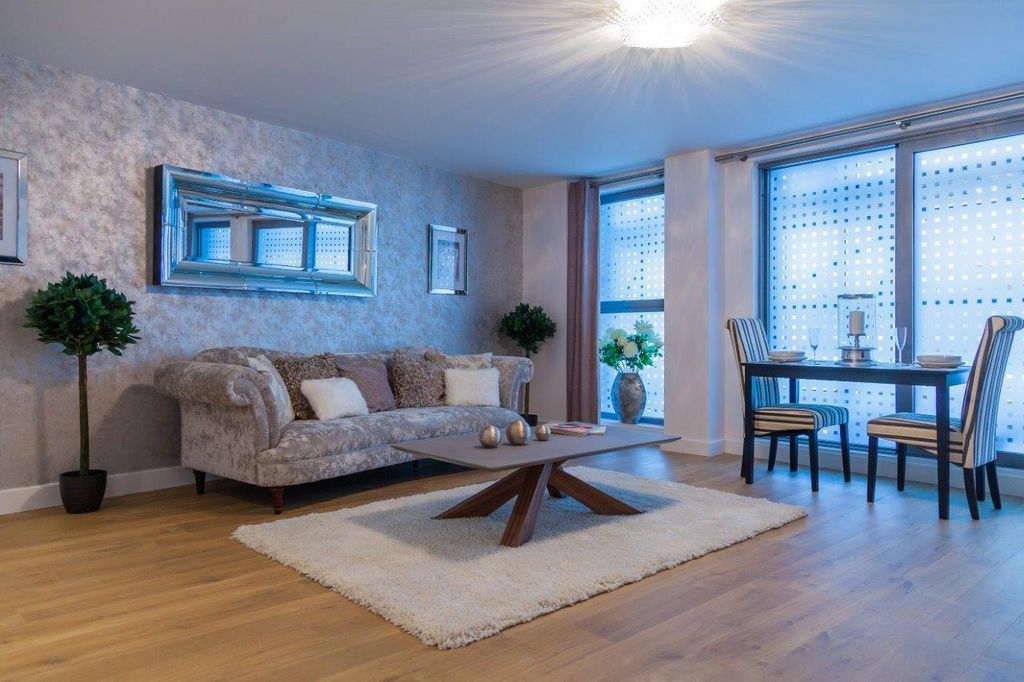Property photo 2 of 5 3 Curvy- Living- Sofa, Table.Jpg