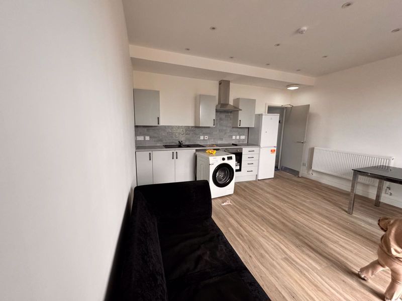 Property photo 1 of 4 Kitchen Living Area