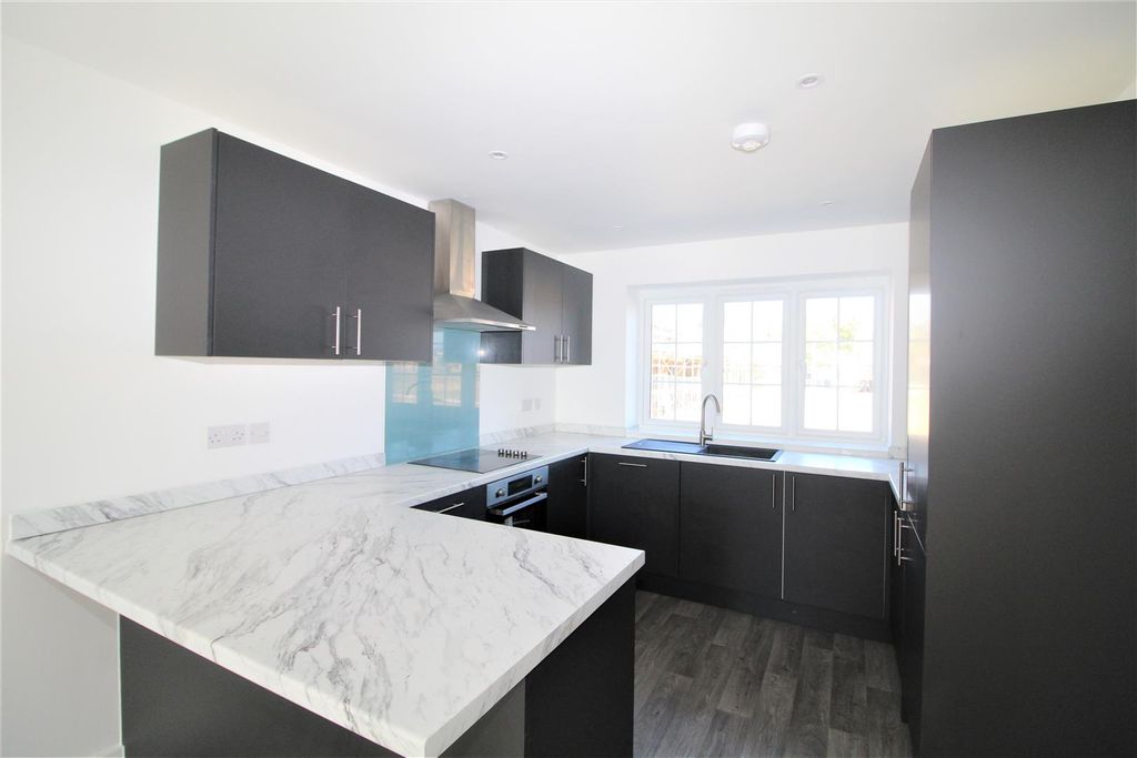 Property photo 2 of 13 Kitchen Area