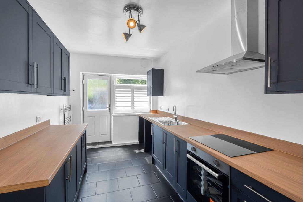 Property photo 2 of 12 Kitchen
