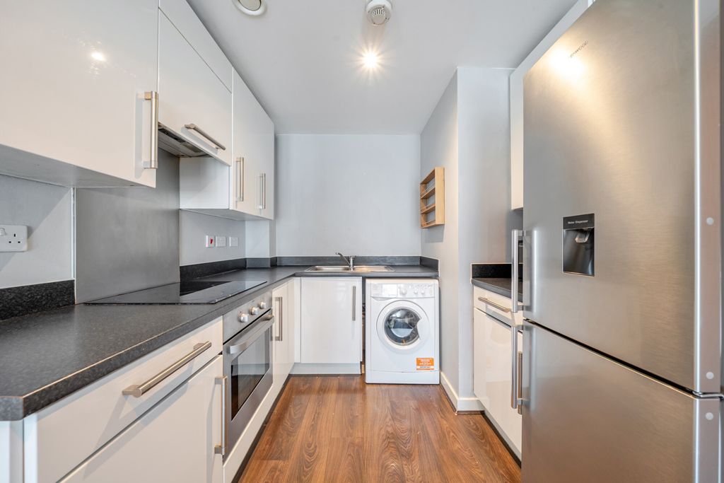 Property photo 3 of 16 Kitchen