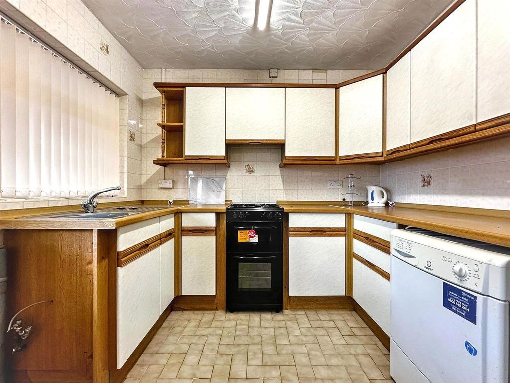 Property photo 3 of 13 Kitchen