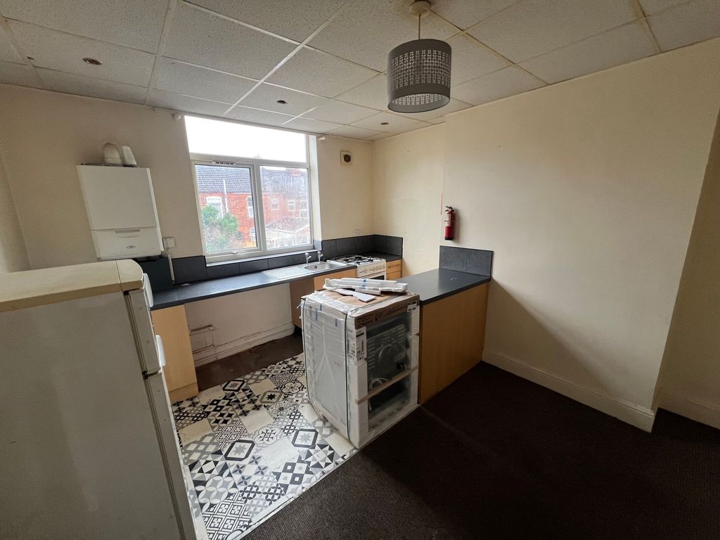 Property photo 2 of 4 A Compact Kitchen Space With Patterned Tiled Floor...