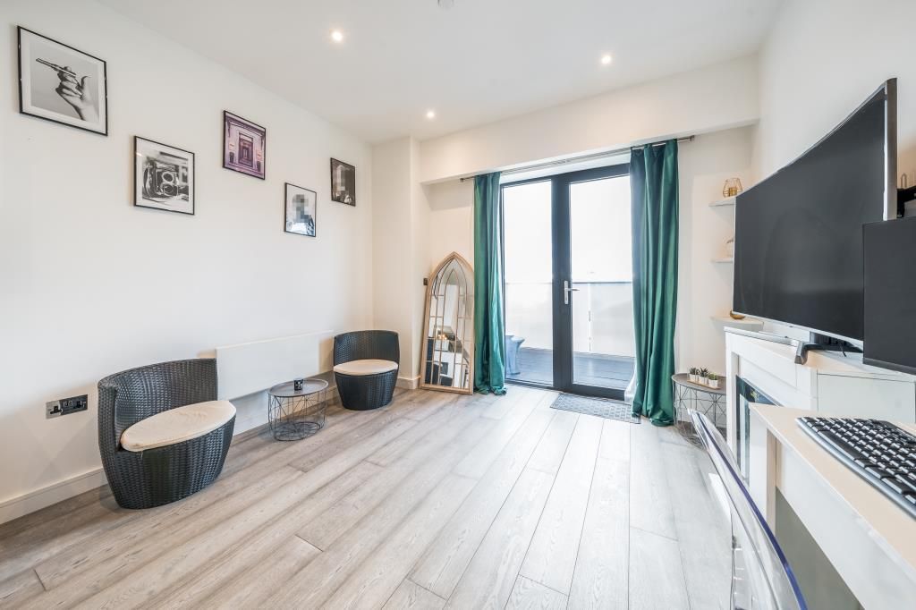 Property photo 2 of 11 Living Area