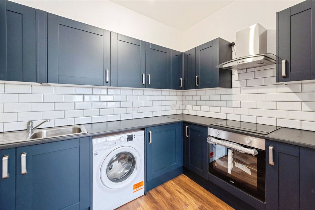 Property photo 2 of 12 Kitchen