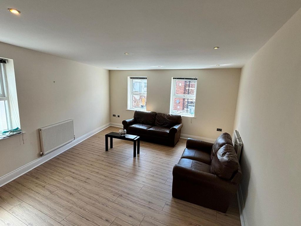Property photo 3 of 12 Living Room
