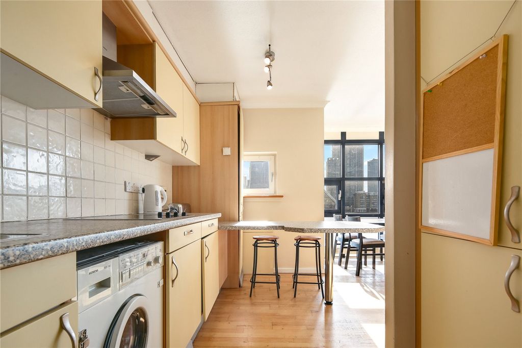 Property photo 3 of 8 Kitchen