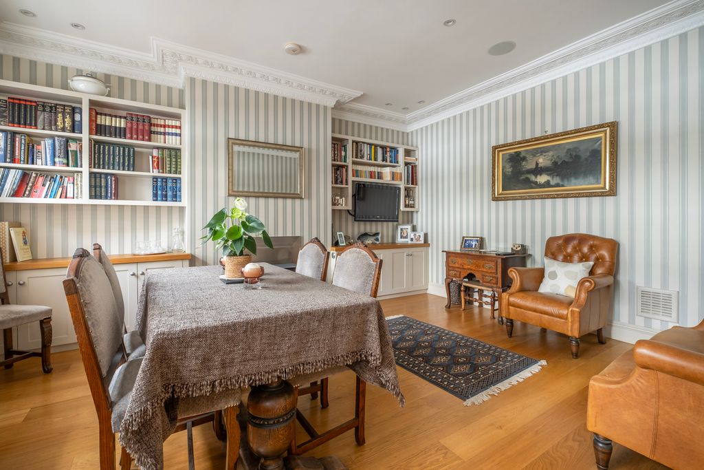 Property photo 1 of 14 Dining Room With Stylish Cornice And Feature Fireplace