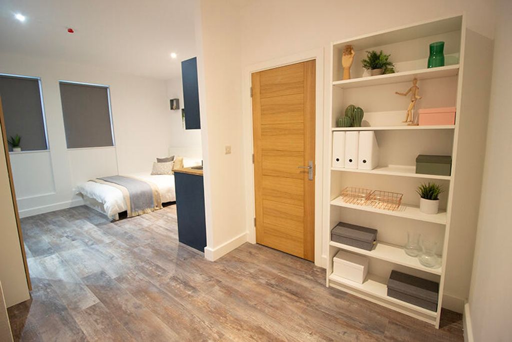 Property photo 2 of 7 This Stylish Double Bedroom Features Modern Furnis...