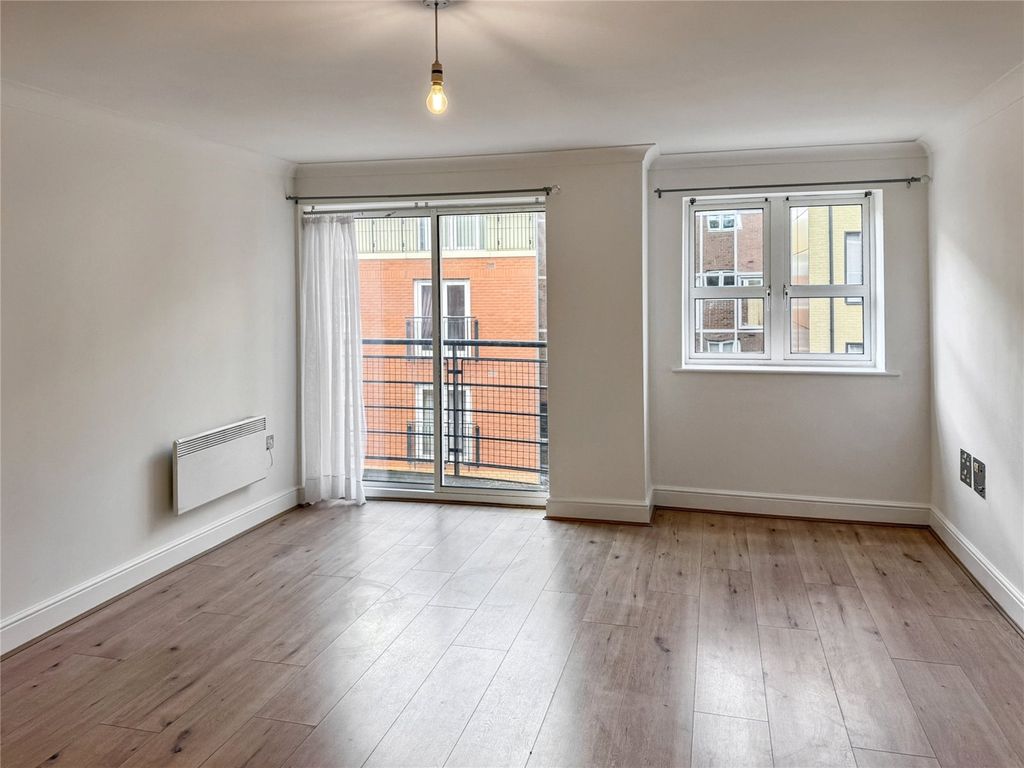 Property photo 2 of 8 Living/Dining Room