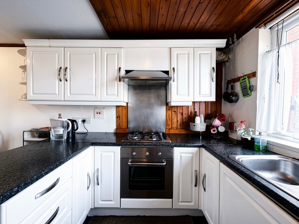 Property photo 2 of 12 Kitchen
