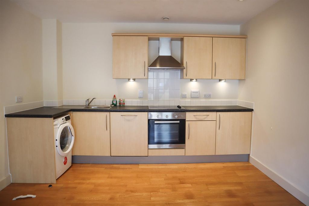 Property photo 3 of 9 Kitchen Area