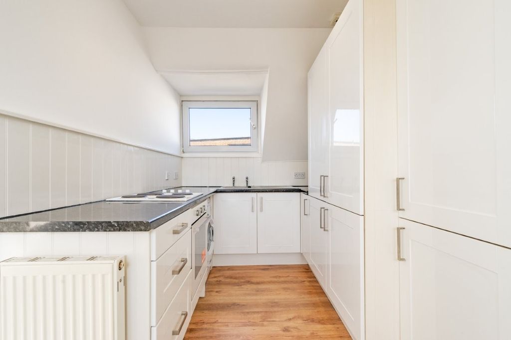 Property photo 3 of 8 Kitchen