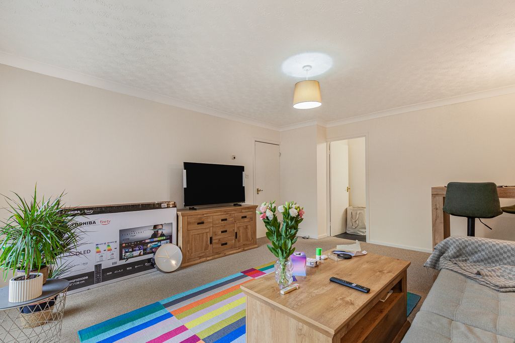 Property photo 2 of 7 Living Room - Angle 1