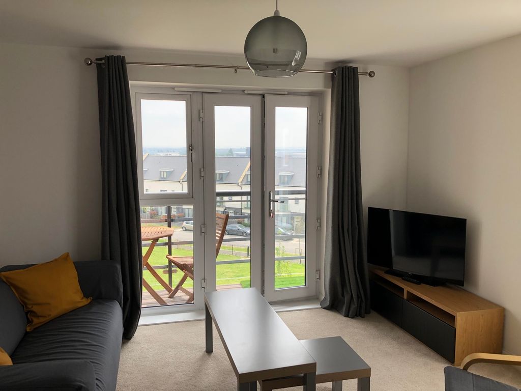 Property photo 1 of 12 A Bright And Inviting Large Modern Living Room Wit...