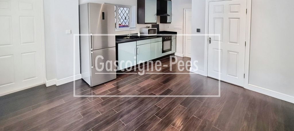 Property photo 1 of 6 Kitchen/Living Room Area