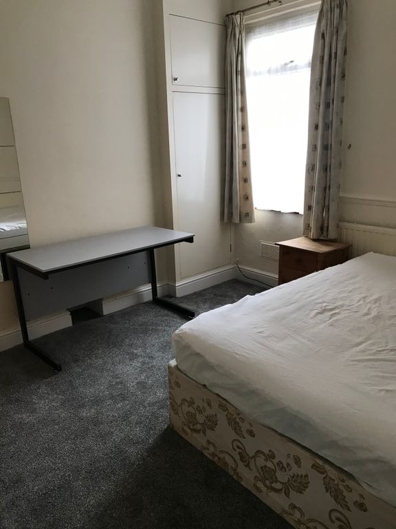 Property photo 3 of 12 A Cozy Double Bedroom Featuring A Comfortable Bed,...