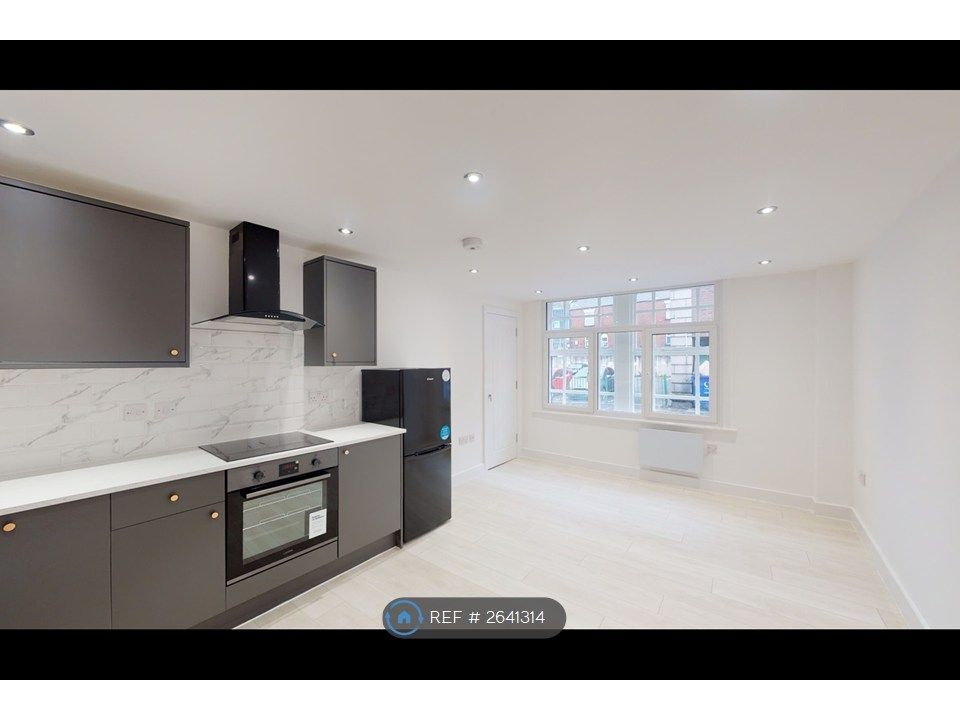 Property photo 1 of 8 Kitchen/Living Area