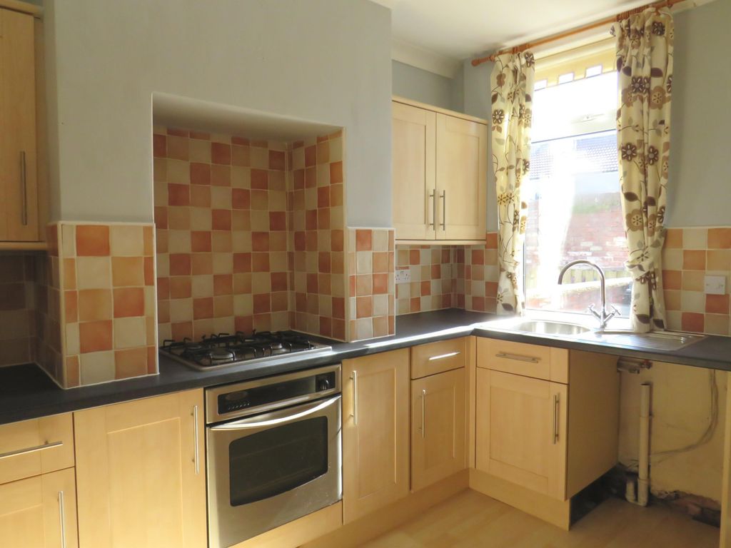 Property photo 2 of 12 Kitchen