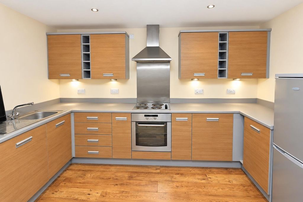 Property photo 3 of 9 Spacious Modern Kitchen With Ample Storage...