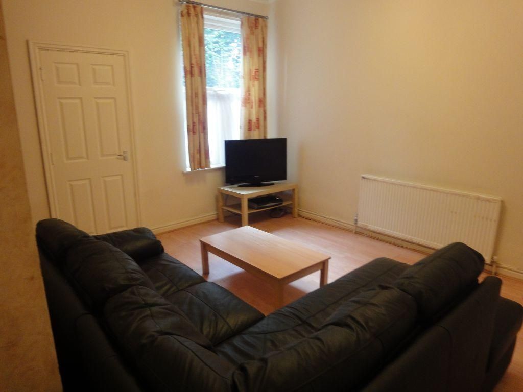 Property photo 2 of 8 Cozy Living Room With A Comfortable Black Sofa Set...