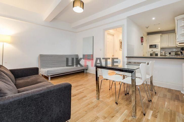 Property photo 3 of 5 A Bright And Modern Living Space Featuring A Comfo...