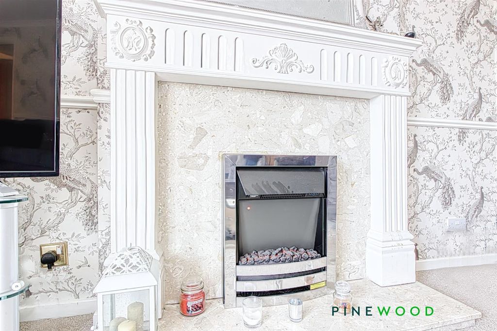 Property photo 3 of 21 Lounge - Fireplace