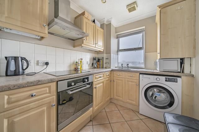 Property photo 3 of 12 Kitchen