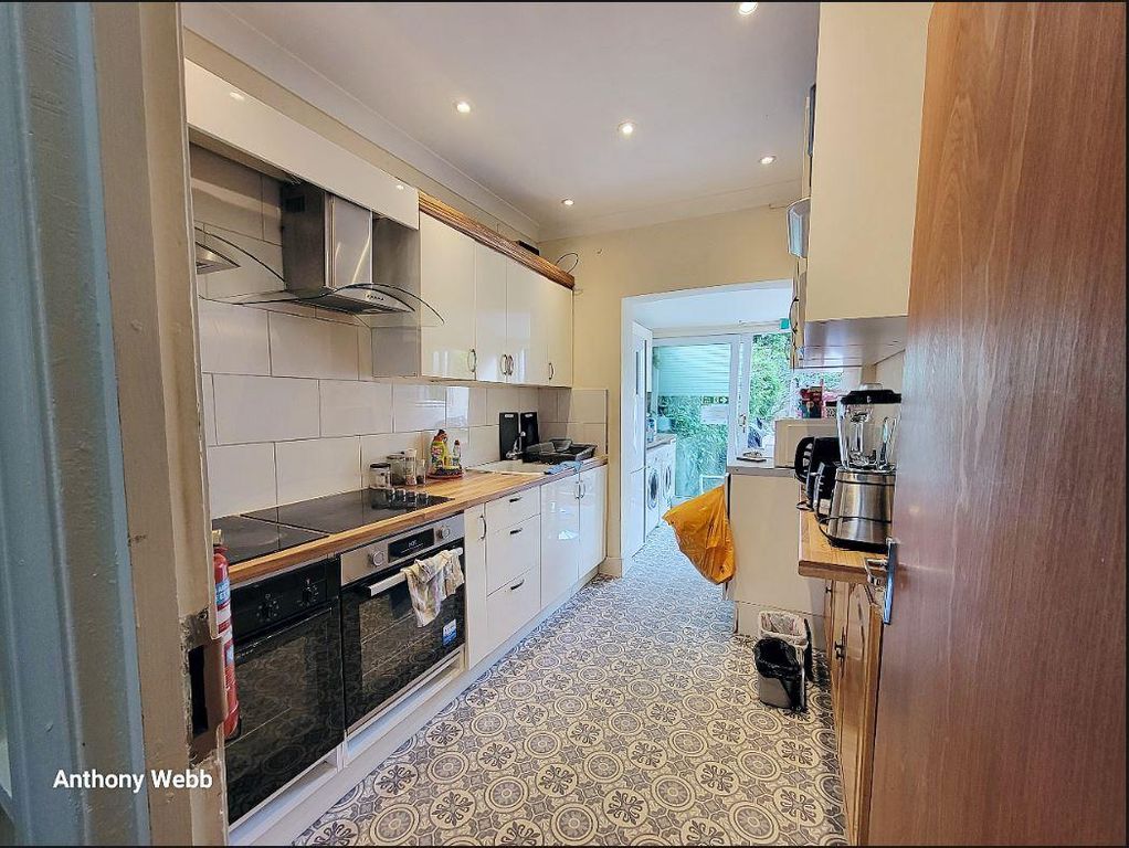 Property photo 3 of 4 Comm Kitchen
