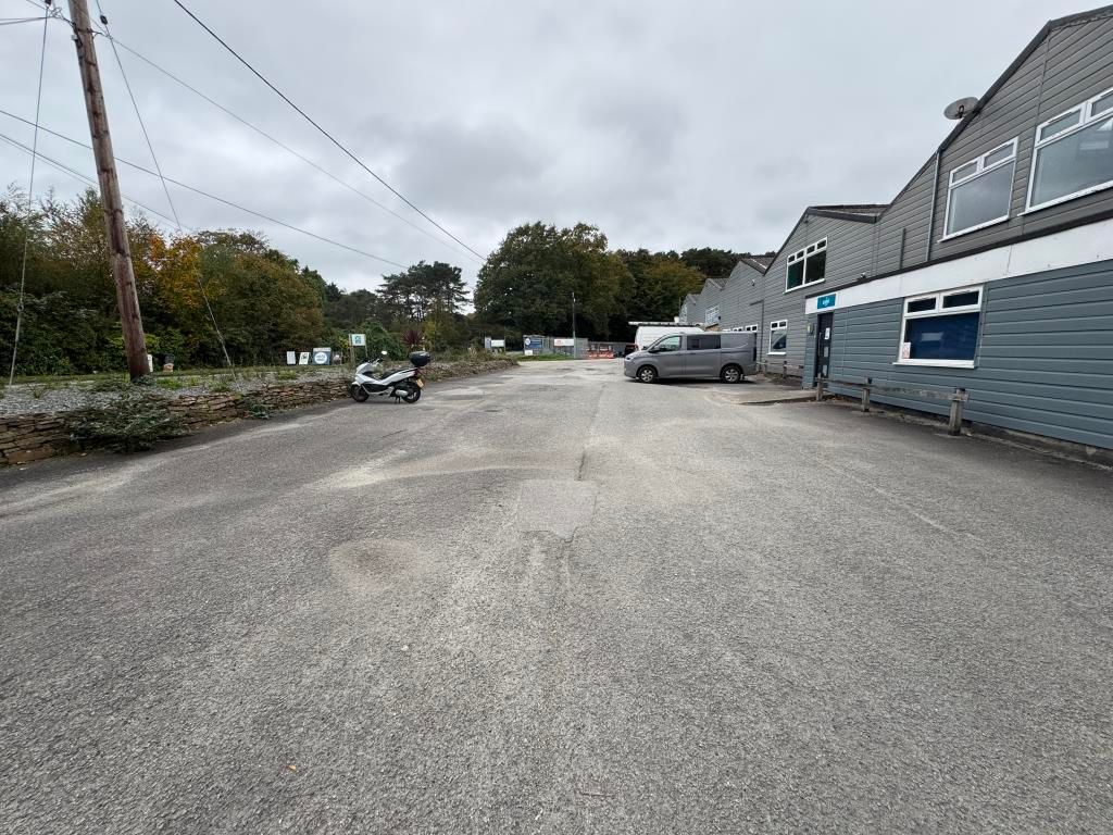 Property photo 3 of 10 Front Parking Area